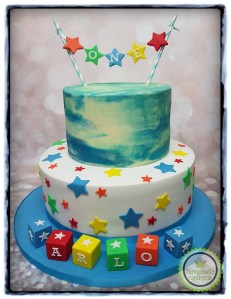 1st birthday cake with stars and building blocks