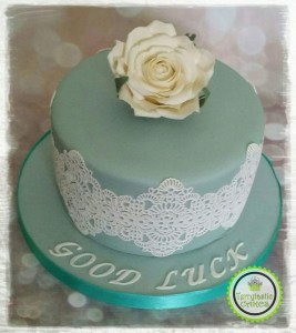Good Luck cake with rose and edible lace