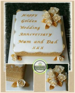 Golden wedding anniversary cake with edible lace and roses