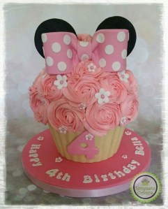 Minnie Mouse themed giant cupcake birthday cake