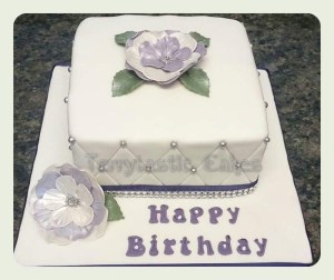 Quilted birthday cake with flowers