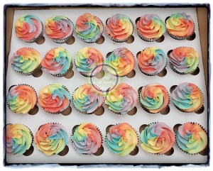 Rainbow swirl piped cupcakes cake